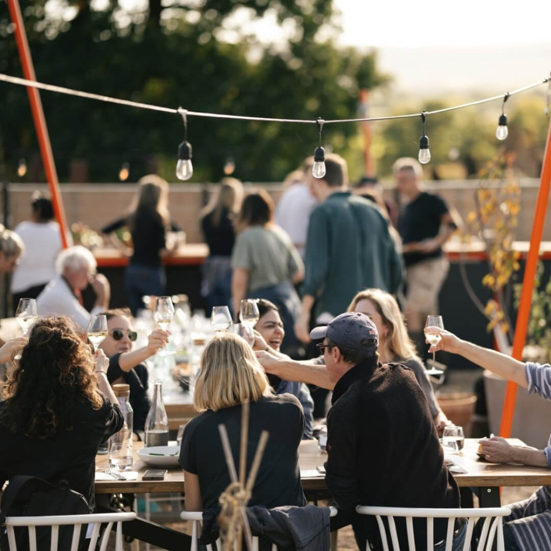 People enjoying wine on the terrace